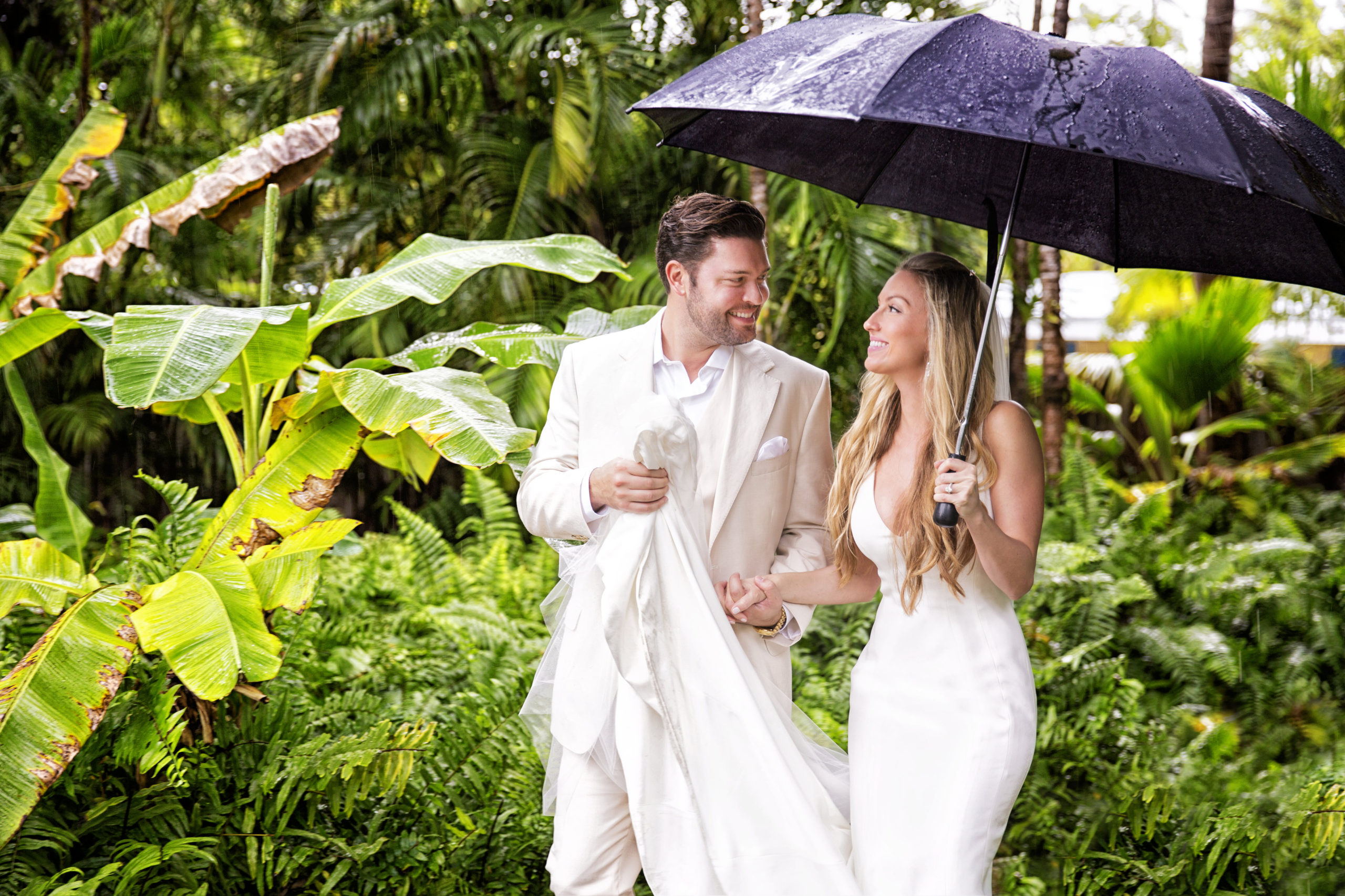 Florida Keys wedding couple walk blissfully in the rain