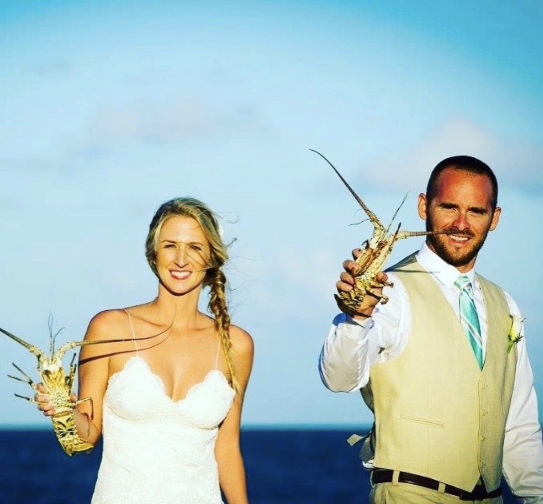 Bride and groom release Florida Keys Lobsters.
